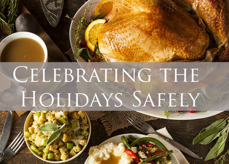 An image of a holiday meal with turkey, stuffing, mashed potatoes and vegetables that reads Celebrating the Holidays Safely.
