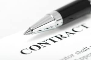 pen on top of contract