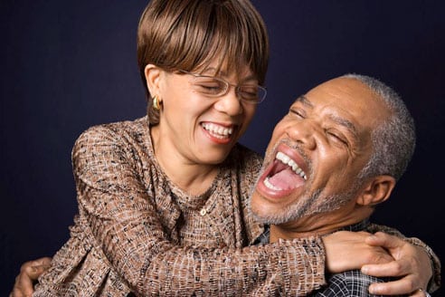 Older couple with a positive mindset laughing